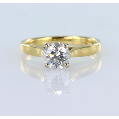 140 - 18ct yellow gold solitaire ring set with a certificated round brilliant cut diamond of 0.77ct, colou... 