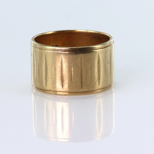 166 - 9ct yellow gold 12mm wide band ring with engraved pattern, size P, weight 7.2g