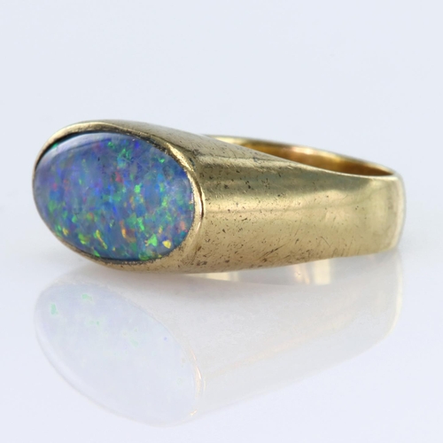 168 - 9ct yellow gold ring set with a composite opal measuring approx. 18mm x 9mm, finger size O, weight 8... 