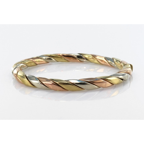 174 - 9ct tri-colour bangle, approx 15.5g