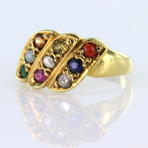 18 - 18ct yellow gold ring with three diagonal panels, each set with three gemstones comprising, sapphire... 