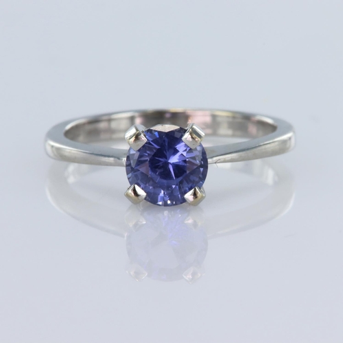 40 - 18ct white gold solitaire ring set with a round tanzanite measuring approx. 7mm diameter, finger siz... 