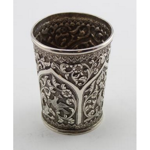 486 - White Metal (silver?) beaker depicting birds & flowers. Height approx 8cm, weight 140g