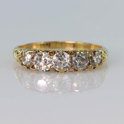 50 - 18ct yellow gold carved head ring set with five graduated old cut diamonds, centre diamond approx. 0... 