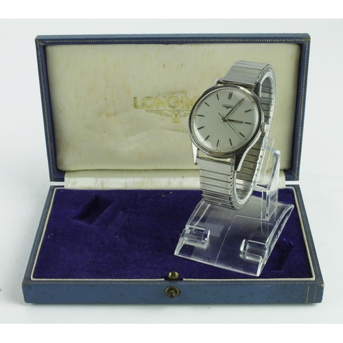 576 - Longines steel automatic wrist watch and box, on expanding generic strap, silver dial and batons. Wa... 