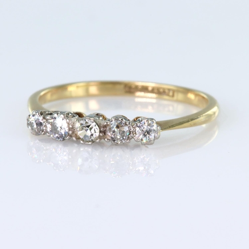 65 - 18ct yellow gold and platinum graduated five stone ring set with round old cut diamonds totalling ap... 