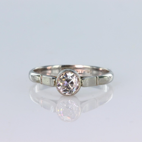 87 - Platinum solitaire ring set with a round old cut diamond weighing approx. 0.50ct in a rub over setti... 