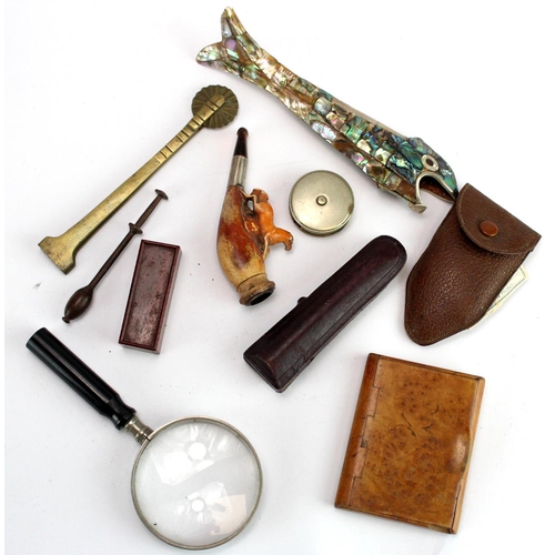 874 - Collectables. A collection of ten various items, including an unusual mother of pearl bottle opener ... 