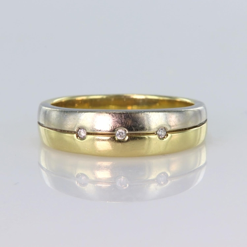 97 - 14ct band ring that flares to the head and splits into yellow and white gold with three round diamon... 