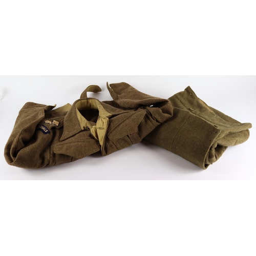 1764 - WW2 1940 pattern battle dress blouse to a Lieut in the Royal Signals dated 1942 with a pair of battl... 