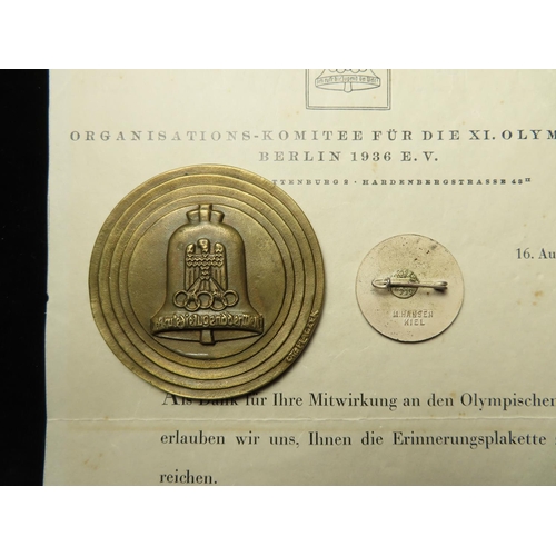 665 - Olympic Participation Medal & Badge for the Berlin Olympics 1936. Medal bronze d.69mm, the official ... 