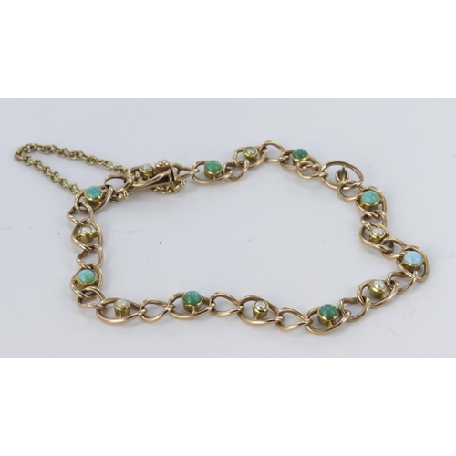 149 - 9ct yellow gold open link bracelet set alternately with seed pearls and 1.5mm turquoise cabochons, w... 