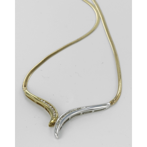 223 - 9ct necklace with a central solid section of half white and half yellow gold, both sections set with... 