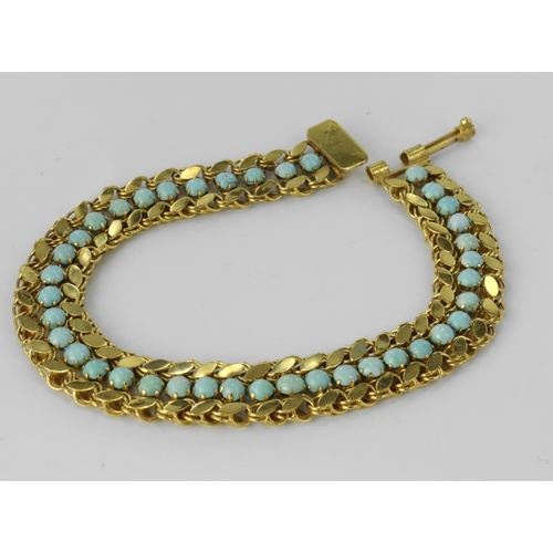 224 - 15ct yellow gold bracelet set with thirty nine round turquoise cabochons, length 18cm, weight 10.2g