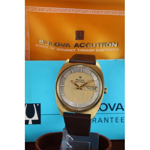 308 - Gents Bulova Accutron wristwatch on its original strap and In its original box with some paperwork. ... 