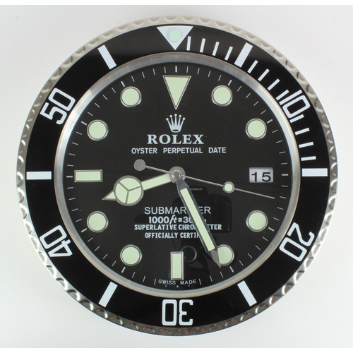 420 - Advertising Wall Clock. Black & chrome 'Rolex' style advertising wall clock, black dial reads 'Rolex... 