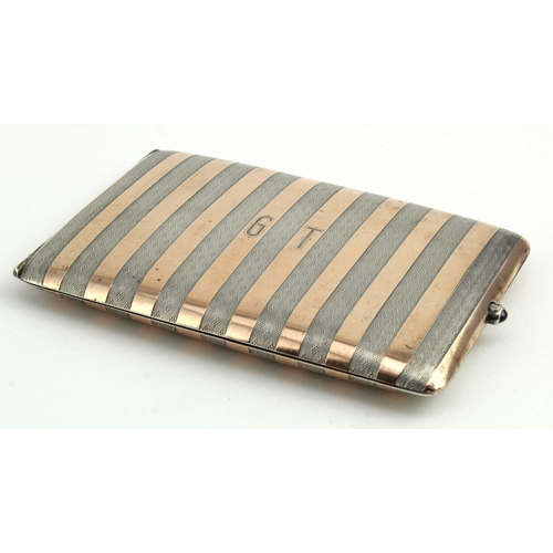 581 - Lovely quality silver cigarette case with gold? inlay (has an inset stone in the stud opener), bears... 