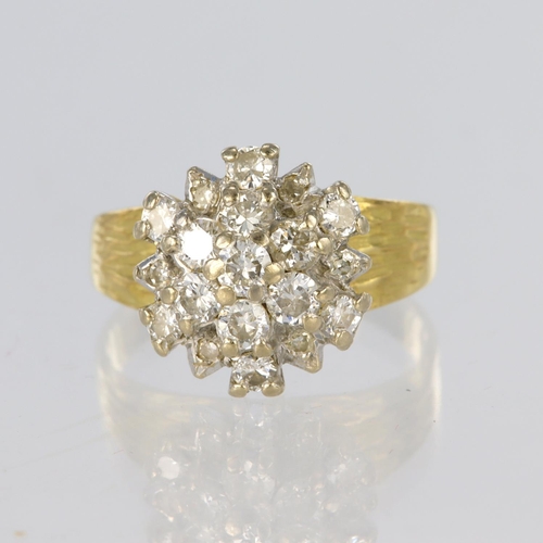 66 - 18ct yellow gold three tier cluster ring set with nineteen round brilliant cut diamonds of various s... 