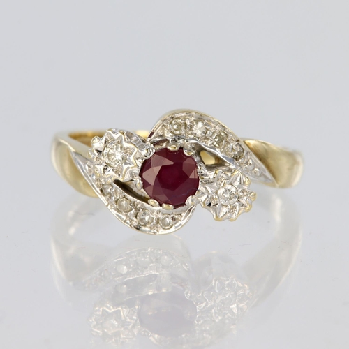 96 - 9ct yellow gold crossover style ring set with a central ruby measuring approx. 4mm diameter with a s... 