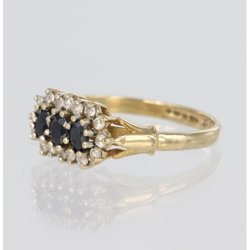 99 - 9ct yellow gold triple cluster ring set with three oval sapphires measuring approx. 4mm x 3mm and si... 