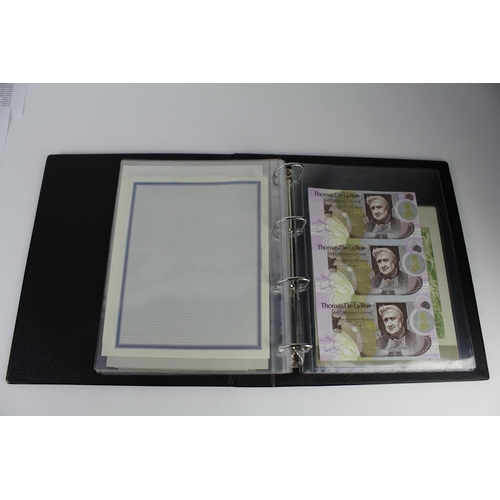 13 - Paper ephemera, Advertising and Test Notes (38) in an album, including Waterlow & Sons, De La Rue, B... 