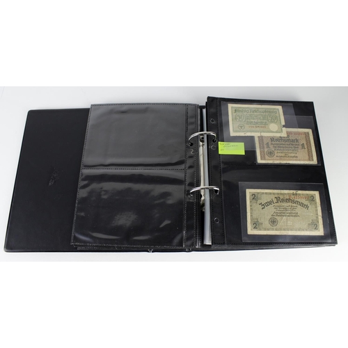 973 - World banknotes in album (136) plus POW and Naffi tokens (26), the majority WW2 issues including som... 