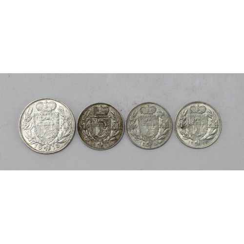 2413 - Liechtenstein silver (4): 2 Krone 1915 EF; 1 Krone: 1900 VF, 1904 VF, and 1915 EF