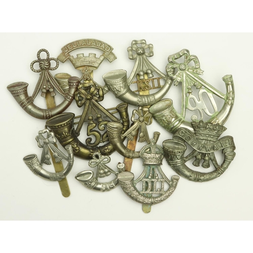 717 - Badges a selection of Light Infantry cap badges 10x