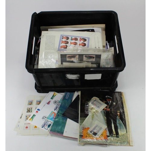 147 - Large black plastic crate with a wide variety of material, loose pages, packets, collectors packs, G... 