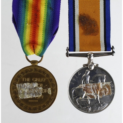 1726 - BWM & Victory Medal to 60267 Pte A E Dodgson Manchester Regt. Sticker marks to reverse. (2)