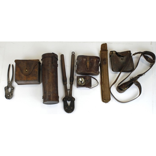 2712 - WW1 equipment including 1918 dated binocular case with binoculars, field saw in leather case, wire c... 