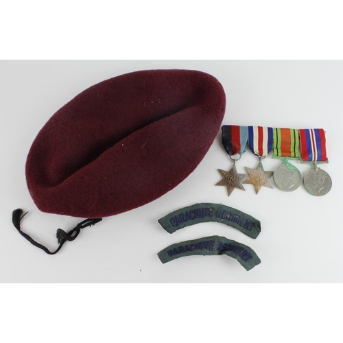 2787 - WW2 Parachute Regiment red beret with cap badge, shoulder flashes and group of WW2 medals 1939-45 st... 