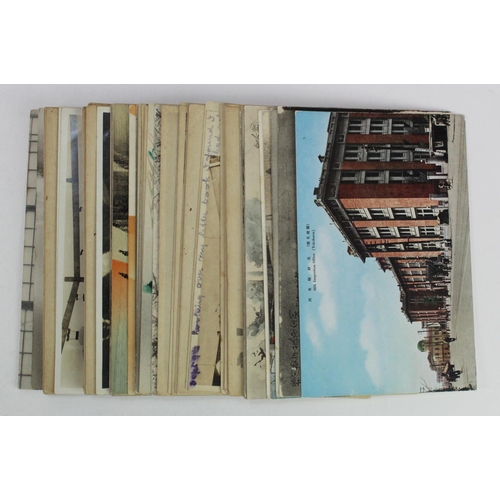 318 - Japan old postcards of street scenes, Yokohama disaster scenes and range of views. (approx 55)