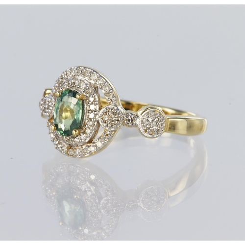 119 - 14ct yellow gold ornate cluster ring set with a central green stone measuring approx. 6mm x 4mm surr... 