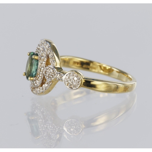 119 - 14ct yellow gold ornate cluster ring set with a central green stone measuring approx. 6mm x 4mm surr... 