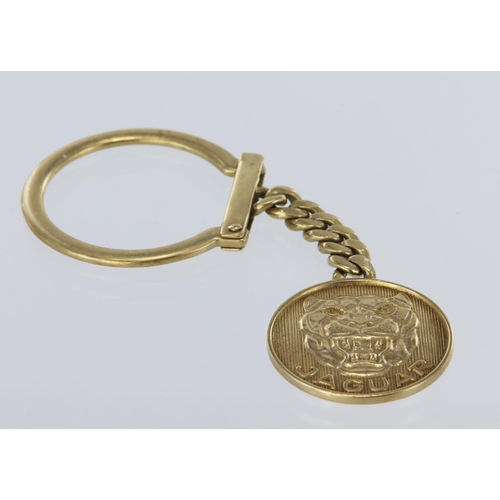 142 - Yellow metal (tests as 9ct) Jaguar keyring, weight 11.8g