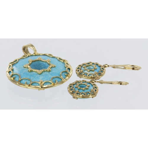 185 - 9ct yellow gold circular pendant set with dyed blue howlite doughnut shaped stone, with decorative g... 