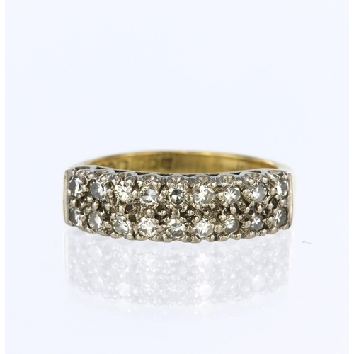 19 - 18ct yellow gold two row half eternity ring set with eighteen round brilliant cut diamonds weighing ... 