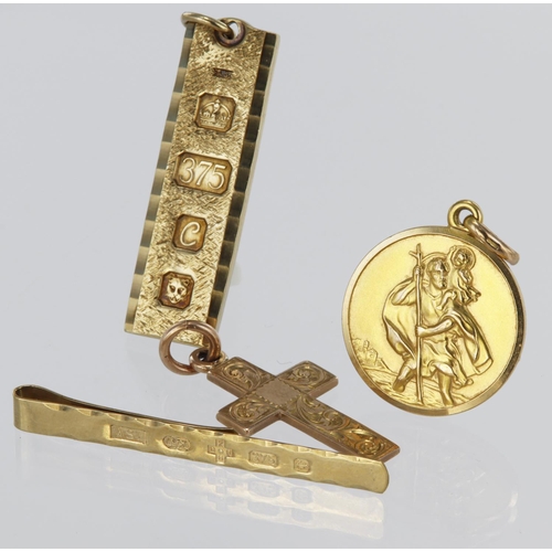 243 - Mixed 9ct gold items (4). Includes Tie clip, Ingot pendant, Crucifix & St Christopher. Total weight ... 