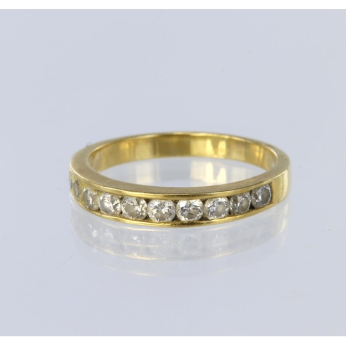 30 - 18ct yellow gold half eternity ring set with ten round brilliant cut diamonds in a channel setting, ... 