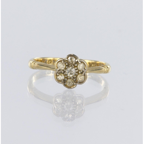 45 - 18ct yellow gold daisy cluster ring set with seven round brilliant cut diamonds totalling approx. 0.... 