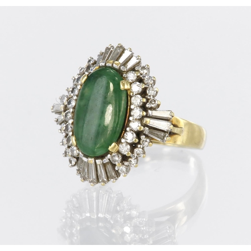 47 - 18ct yellow gold dress ring set with an elongated oval jadeite measuring approx. 14mm x 9mm, surroun... 