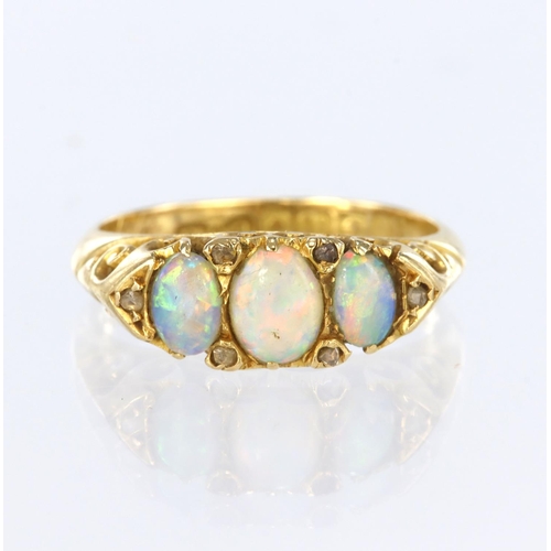 49 - 18ct three stone Opal ring, hallmarked Birmingham 1902, size L, weight 4.8g
