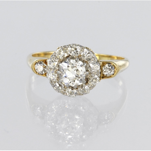 5 - Tests as 18ct yellow gold cluster ring set with a central round old cut diamond weighing approx. 0.5... 