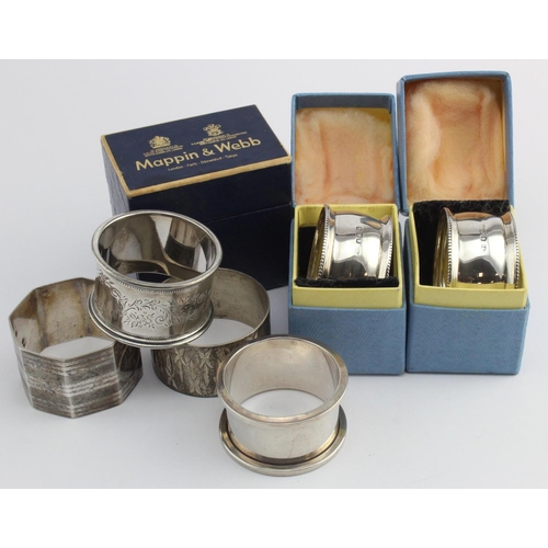 560 - Seven silver napkin rings, approx 171g