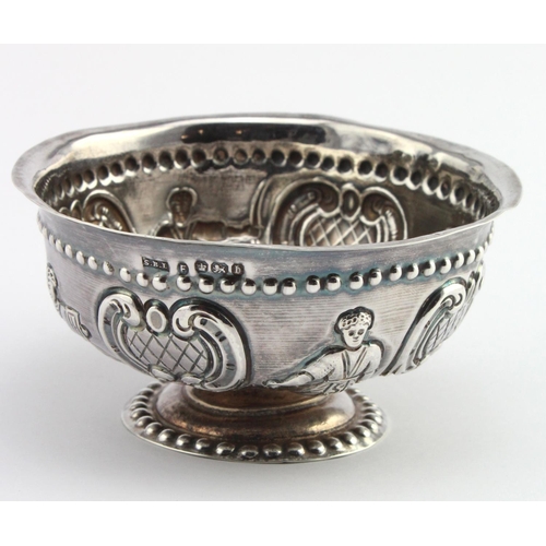 563 - Unusual continental silver bowl with embossed figures on it, has continental marks on the base and b... 