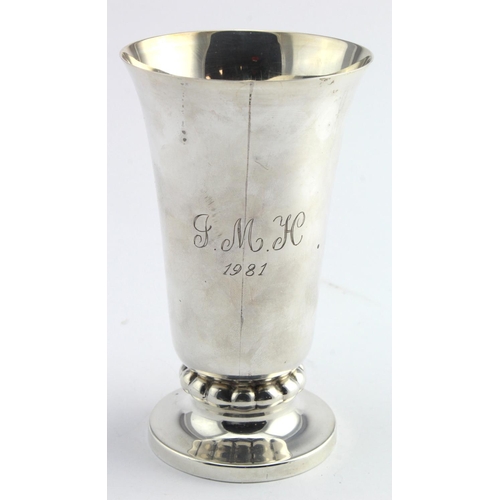 564 - Silver cup on a pedestal base, engraved intials & date to side, hallmarked 'JN, London 1975', height... 