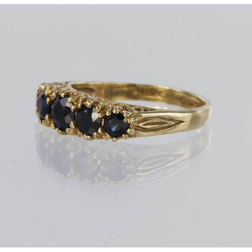 63 - 9ct yellow gold carved head ring set with five round graduated sapphires measuring approx. 4.5mm, 3m... 