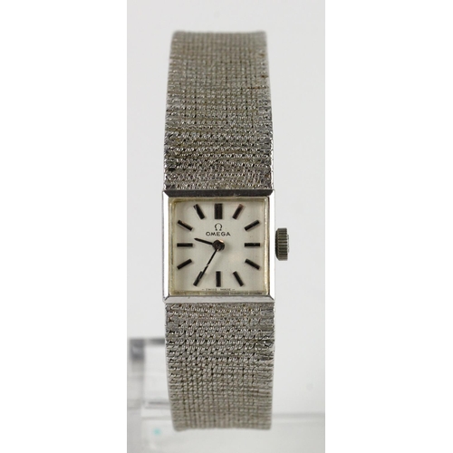 642 - Ladies 9ct white gold cased manual wind Omega wristwatch on a 9ct white gold integral bracelet. Purc... 