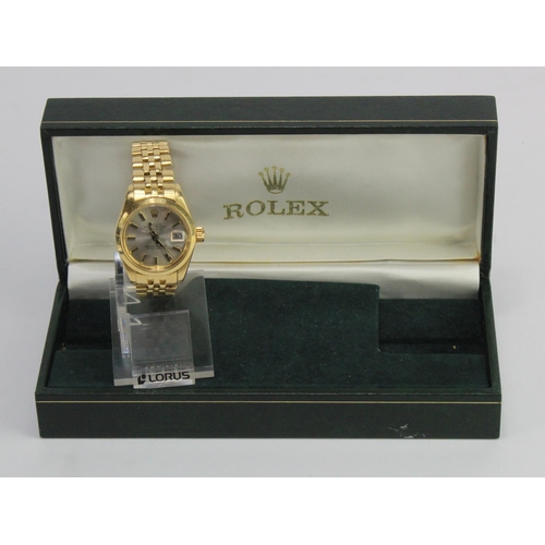 663 - Ladies 18ct Rolex Oyster Datejust. Model 6916/8. On a 18ct Rolex Jubilee bracelet. Watch working whe... 